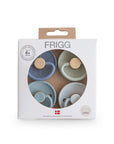 Packaged Skyline Serenity FRIGG baby pacifier set on a white background