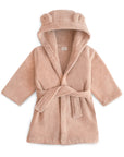 The mushie Bear Robe in blush is a plush toddler bathrobe with a hood featuring two bear ears and a matching waist belt, shown on a white background.