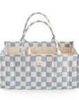 Mushie Diaper Caddy: blue/white checkered, quilted, with handles and multiple compartments.