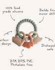 The mushie Dino Teething Ring has three animal pendants and a green beaded ring, made from food-grade silicone to encourage fine motor skills. Its perfect grip design is dishwasher safe and free from BPA, BPS, PVC, and phthalate.