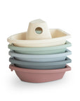 Product Image of mushie Bath Boats, with 5 plastic boats stacked on each other.