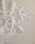 Lifestyle image of Organic Cotton Swaddle in Boats