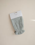 Mushie Moss Bath Mitt in packaging