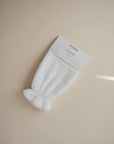 Mushie Pearl Bath Mitt in packaging
