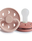 FRIGG Moon Silicone Pacifier 2-Pack in pink with round shields and soft silicone nipples.