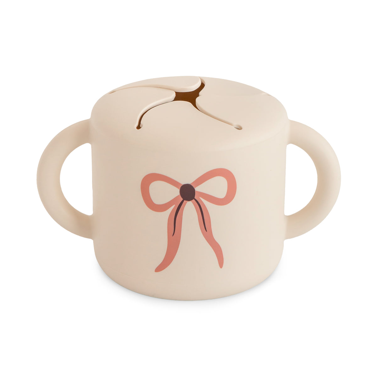 Mushie Snack Cup, Bows color, spill-proof with handles—perfect for toddlers.