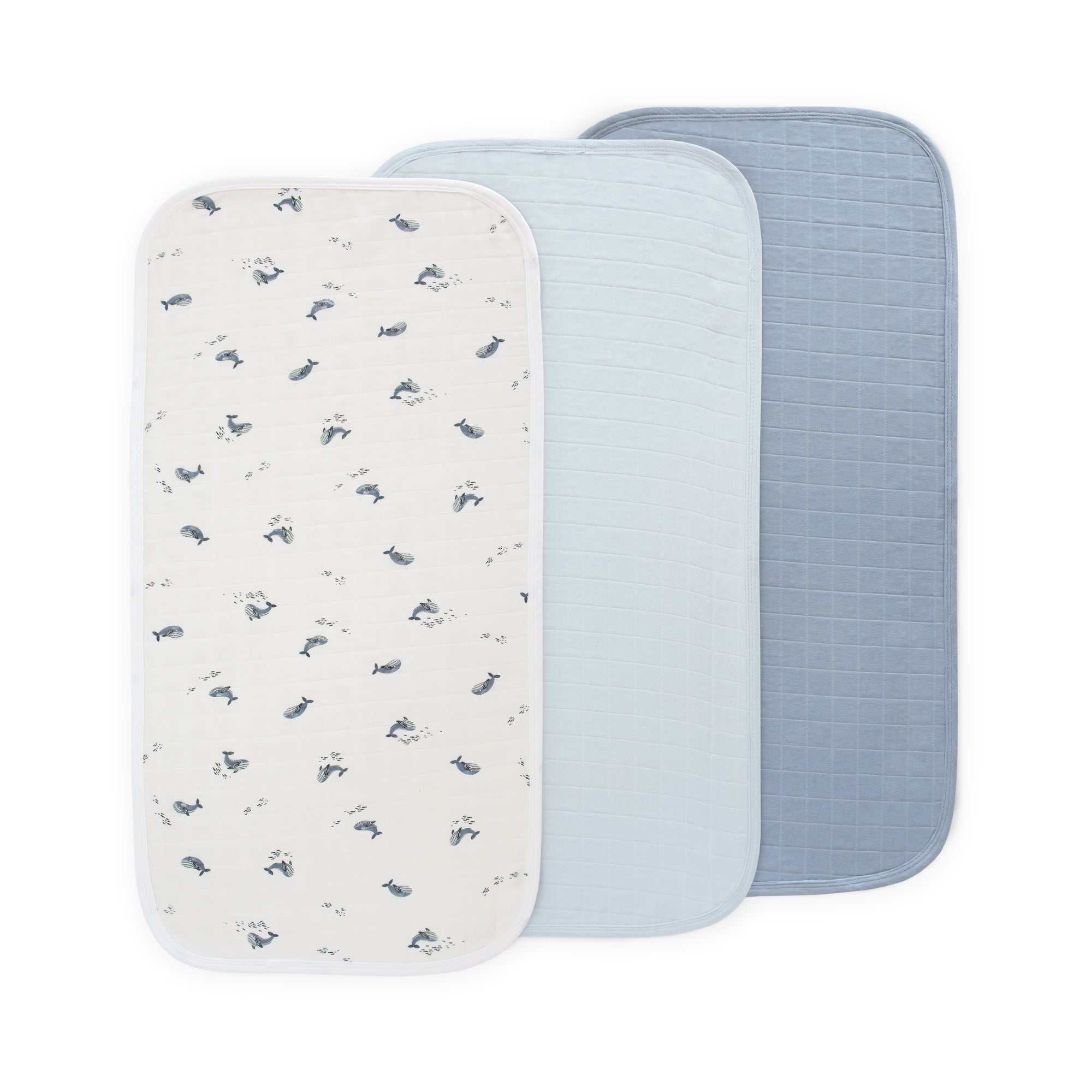 Set of 3 Mushie Changing Pad Liners: one patterned, one light blue, one dark blue.