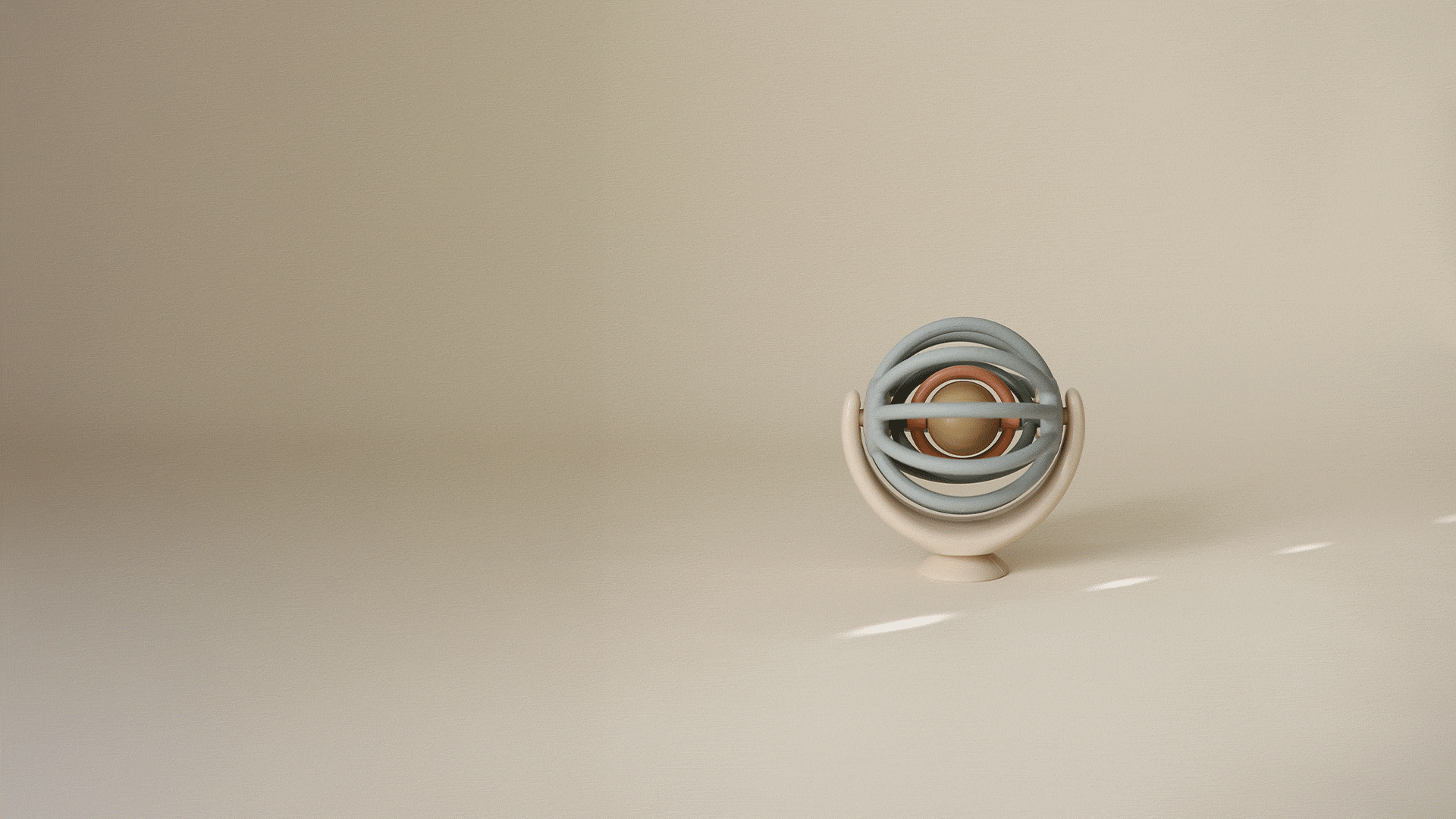 Mushie suction spinner ball sensory toy displayed on a solid beige background.