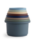 Mushie Stacking Cups Toy in muted colors brings Danish Hygge to your baby’s playtime.