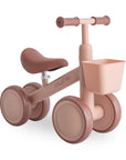 Mushie Mini Toddler Bike in Blush with front basket—ideal as a toddler's first bike.