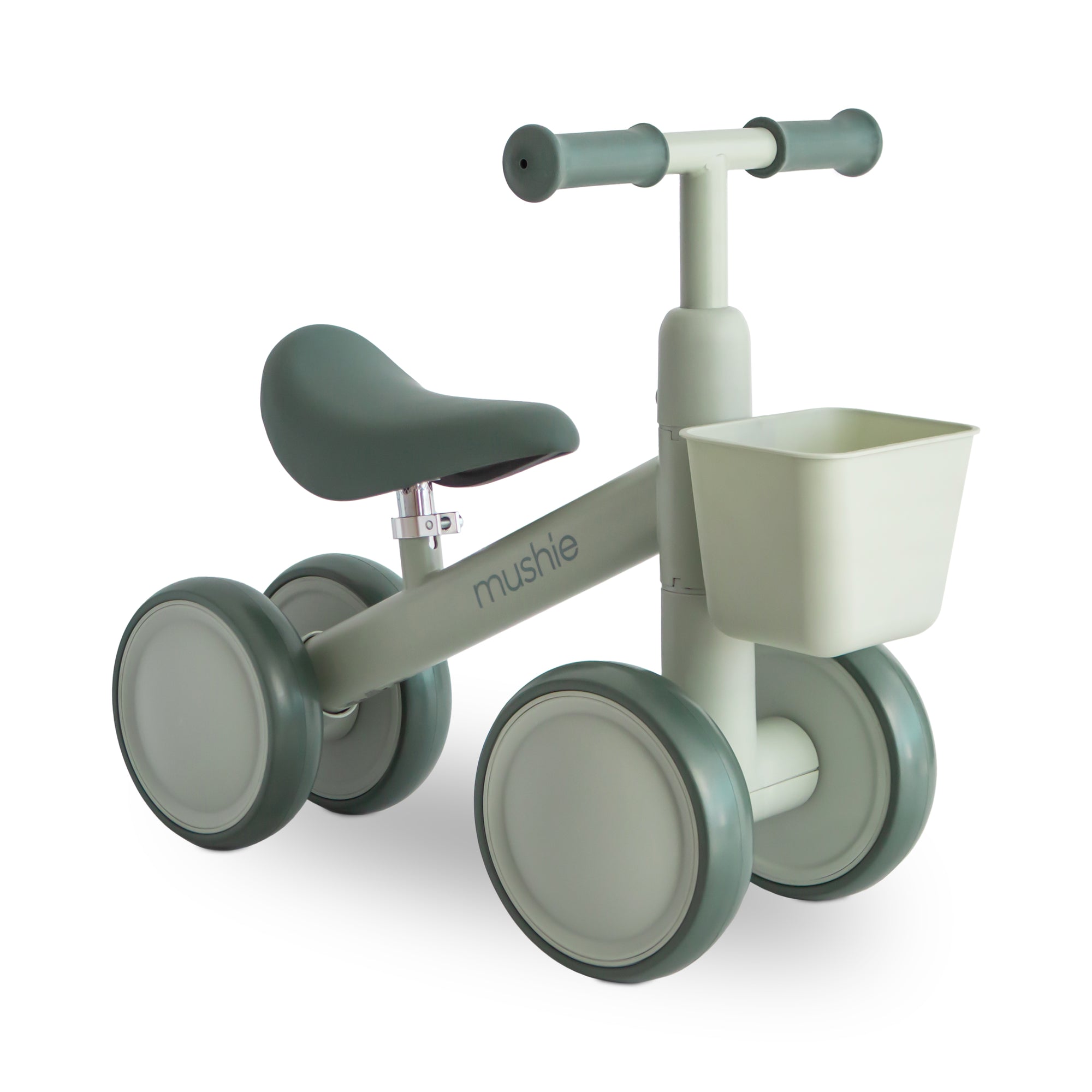 Sage Mini Toddler Bike by mushie with a front basket and four thick wheels.