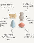 The mushie Space Mold Free Bath Play Set includes four silicone bath toys—a star, astronaut, rocket, and planet—with a two-piece design to prevent mold. Dishwasher safe, free from harmful chemicals, and encourages fine motor skills and imaginative play.