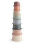 Mushie Stacking Cups Toy: eight colorful, nested cups inspired by Danish Hygge style.