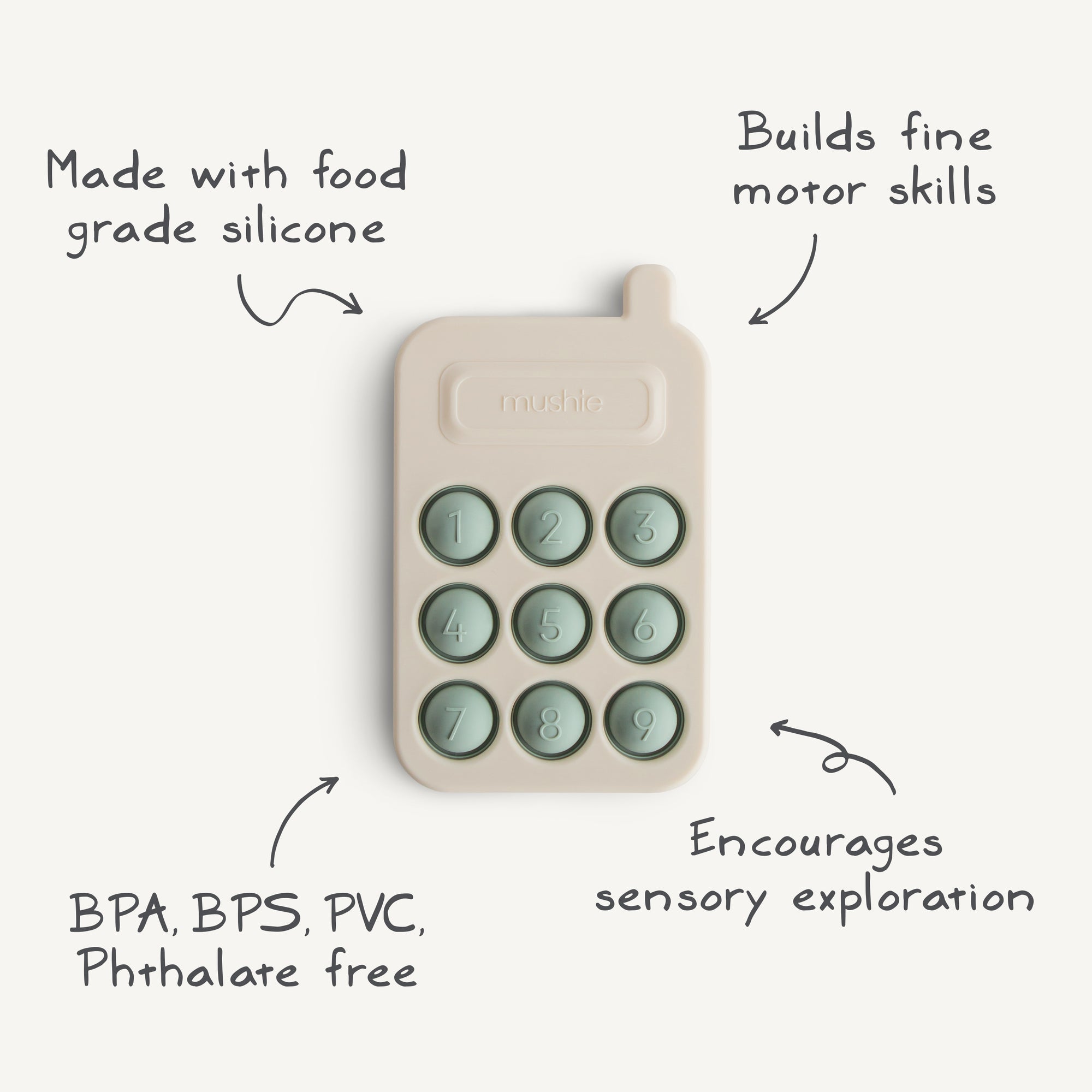 The mushie Phone Press Toy is a beige, food-grade silicone toy with nine green buttons. BPA/BPS/PVC/phthalate free, it helps build fine motor skills and encourages sensory exploration for little hands.