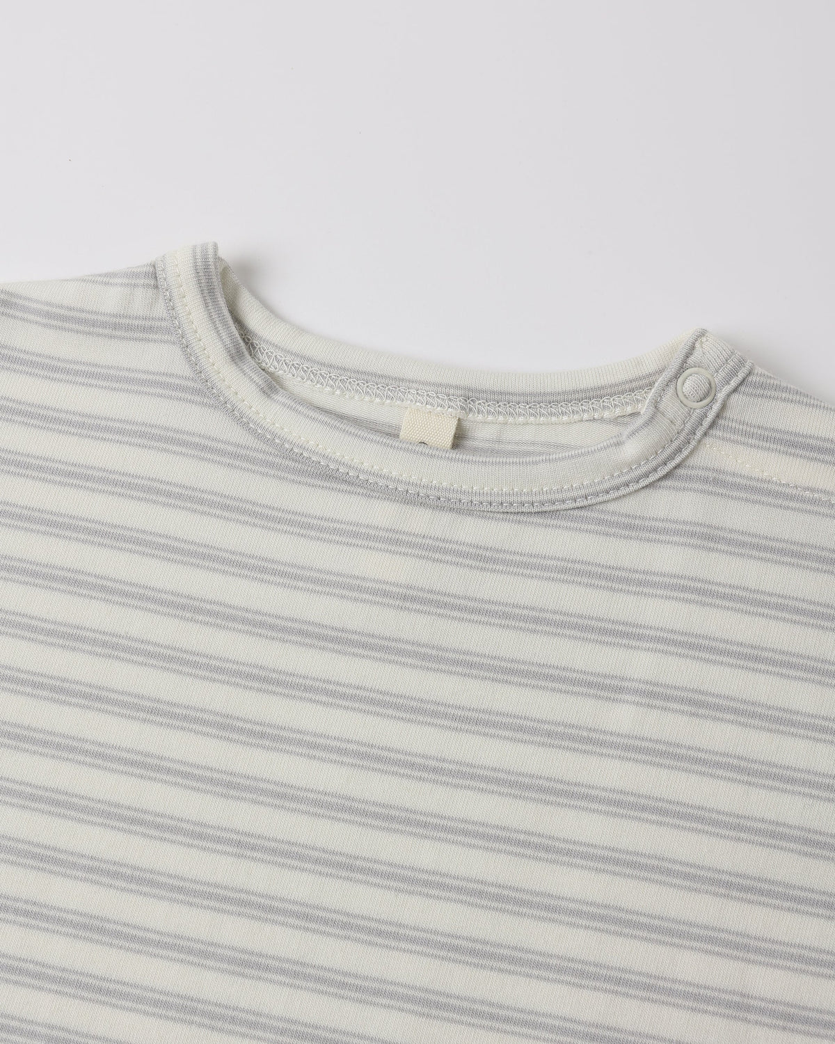 Rylee + Cru Long Sleeve Tee Cloud Stripe, GOTS cotton, baby snaps, shown flat.