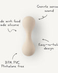 The mushie Silicone Baby Rattle Toy features an hourglass shape, gentle sensory sound, easy-to-hold design, and is made from food-grade silicone that’s BPA, PVC, and phthalate free for a safe sensory experience.