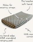 Mushie Extra Soft Muslin Changing Pad Cover—100% cotton, feature labels, and arrows shown.